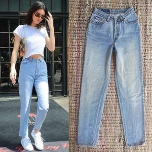 Vintage Levi’s 17501 high rise button fly tapered 90s mom jeans made is USA 7